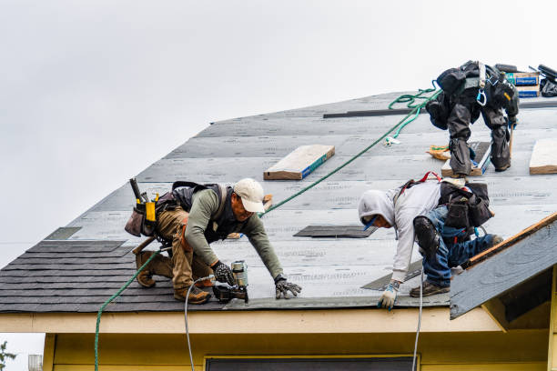Professional Gutter Installation technician working in Stanford, CA